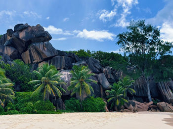 Scenic view of waterfall against sky