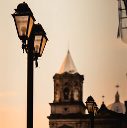 Low angle view of street light against sky