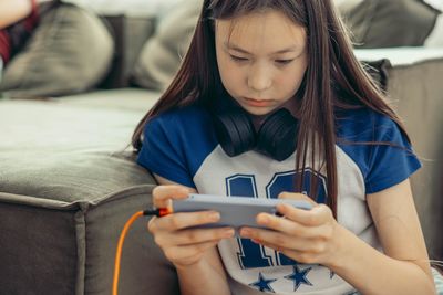 Young woman using mobile phone