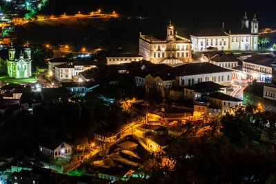 High angle view of illuminated buildings at night