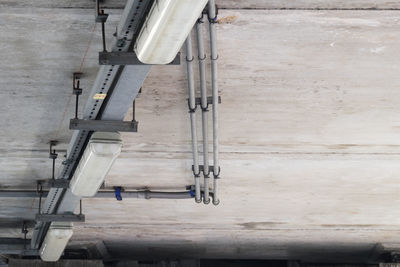 Low angle view of pipes on wall