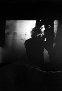 Reflection of woman in mirror