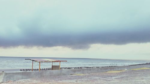 Scenic view of beach against sky