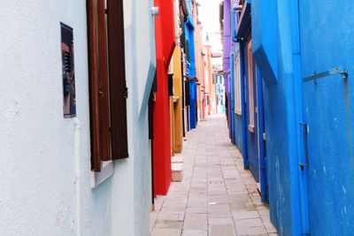 Alley amidst buildings in city