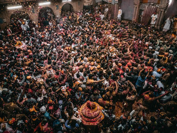 High angle view of people standing on street