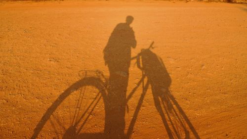 Shadow of woman on wall
