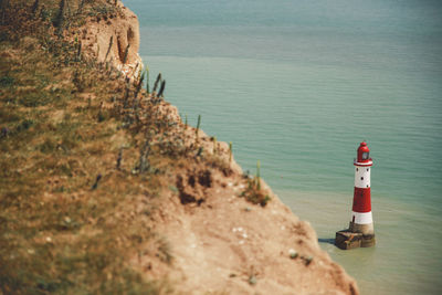 High angle view of lighthouse at sea