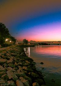 Scenic view of sea against sky at sunset