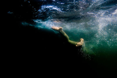 People swimming in sea