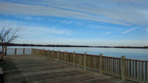 Pier over sea against sky