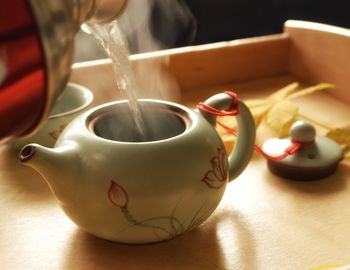 Close-up of teapot on table