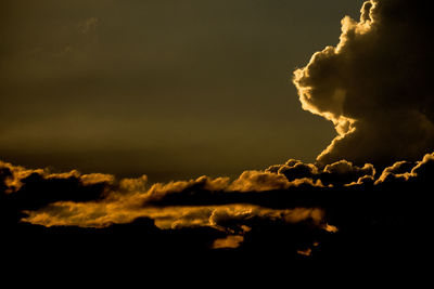 Low angle view of dramatic sky at sunset