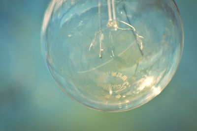 Close-up of illuminated light bulb