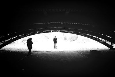 Full length of woman in tunnel