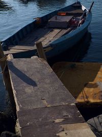 High angle view of boats moored at pier