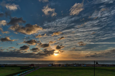 Scenic view of sea against dramatic sky