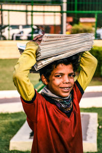 Portrait of young man standing outdoors