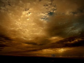 Scenic view of dramatic sky during sunset