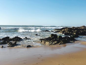 Scenic view of sea against clear sky