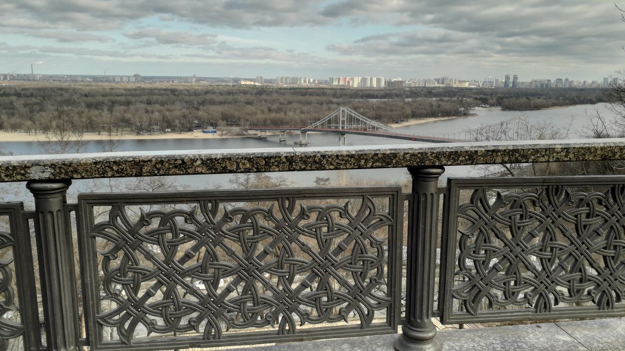 VIEW OF BRIDGE OVER RIVER AGAINST SKY