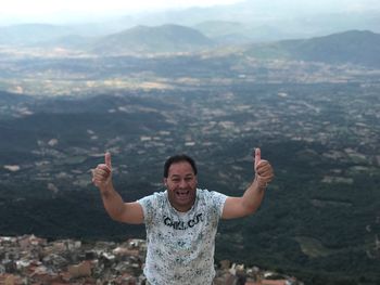 Portrait of happy man showing thumbs up at gennargentu national park