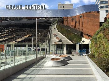 Empty walkway along buildings