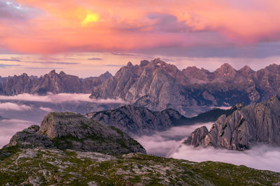 Scenic view of mountains against sky during sunset