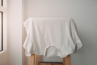 Portrait of woman with towels at home