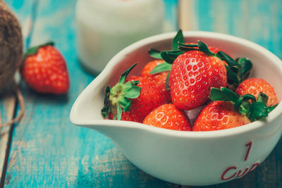 Close-up of strawberries in bowl on table