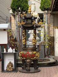 Statue of buddha outside building