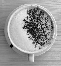 High angle view of coffee cup on table