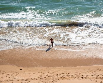 Full length of boy on beach