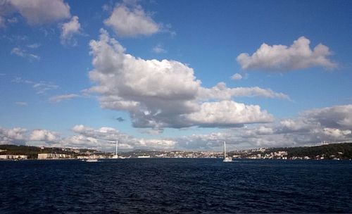 Scenic view of sea against blue sky