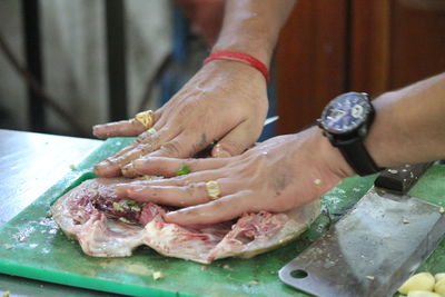 Close-up of person preparing food