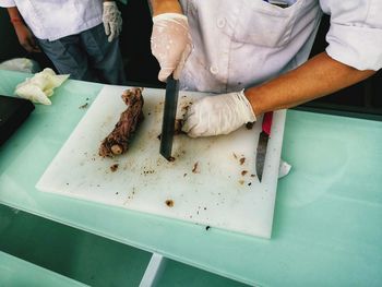 High angle view of man preparing food
