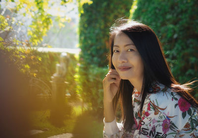 Portrait of young woman looking away