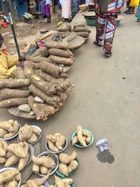 Group of people for sale at market stall