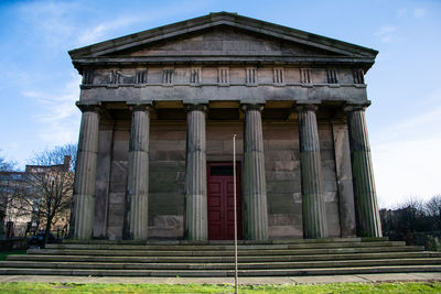 Low angle view of old building against sky