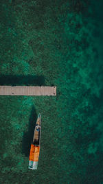 High angle view of boat floating on sea