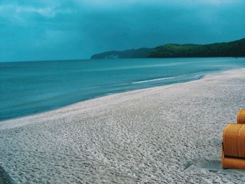 Scenic view of beach against sky