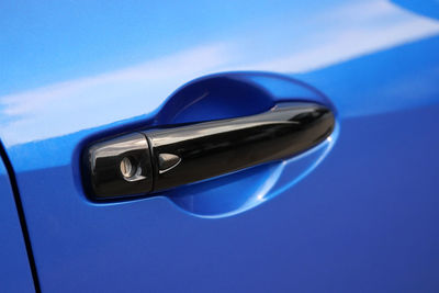 Close-up of car door handle