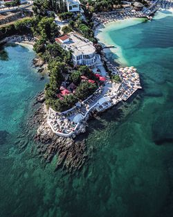 High angle view of cliff by sea