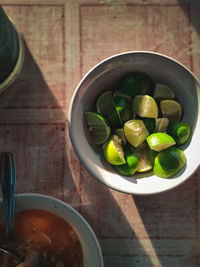 High angle view of fruits in bowl on table