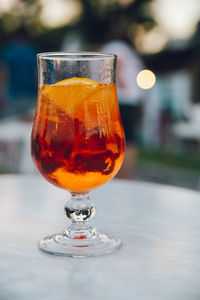 Close-up of wineglass on table