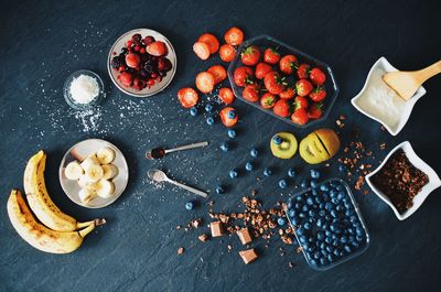 High angle view of fruits on cake