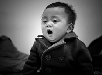 Close-up of cute boy at home