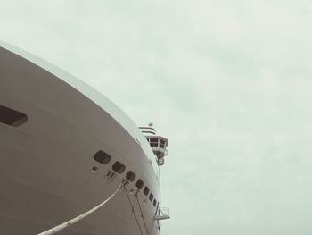 Low angle view of airplane against sky