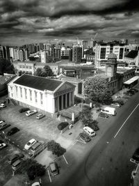 City street against cloudy sky