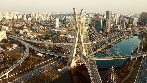 High angle view of bridge and buildings in city