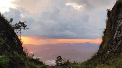 Scenic view of tree mountains against sky